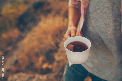 Closeup Of White Cup With Tea Young Man Holding A Coffee Young Man Holding A Cup With Coffee Outdoors