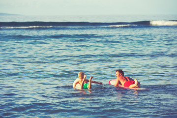 Father and Son Surfing