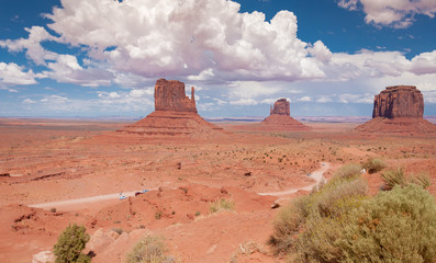 Monument valley under cloudy sky