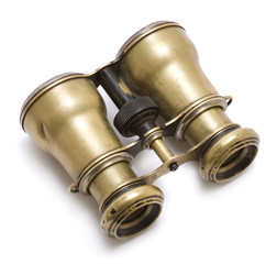 Old binoculars isolated on white background