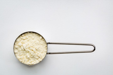 Fototapeta na wymiar scoop of whey protein powder