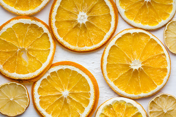 Fototapeta na wymiar Dried orange and lemon on old white painted wood.