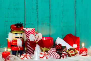 Holiday decorations by antique teal blue wood background