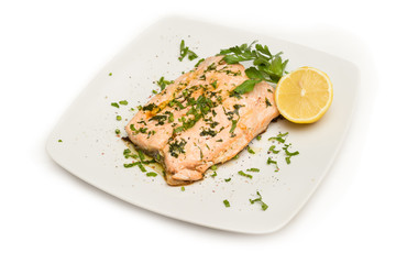 Poached salmon with extra virgin olive oil and parsley 