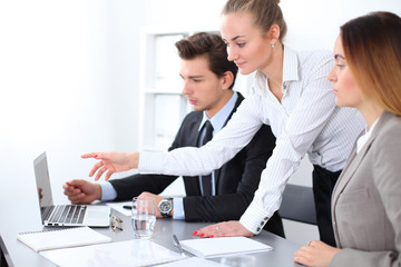 Fototapeta premium Group of Business people at meeting, focus on blond business woman