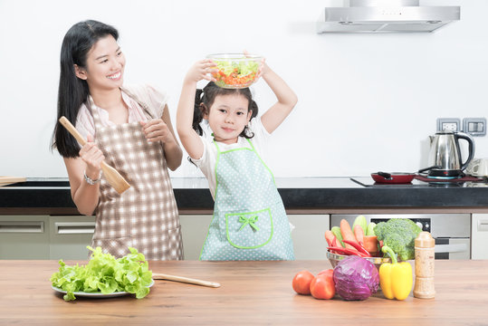 Family, Children And Happy People Concept - Asian Mother And Kid