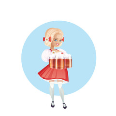 Attractive woman in dirndl with beers