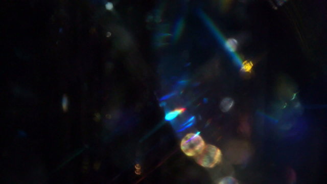 Multi-coloured sparkle, twinkle background - real footage, not rendered