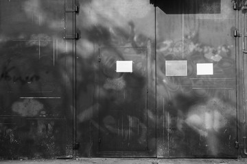 Black wall/Black and white of door was closed on the black wall.