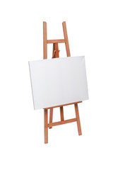 White painter canvas on wooden easel isolated on white with clip