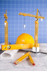 Buildings under construction and cranes   © dianaduda