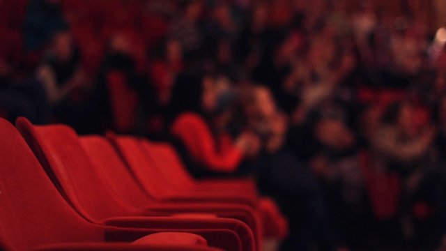 Dark Blur Audience in the cinema Theater