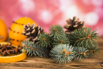 Fototapeta na wymiar Christmas, oranges and cinnamon with anise,