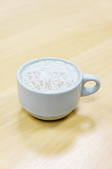 Cup of coffee spill on desk