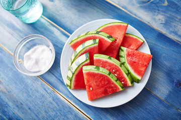 watermelon slices with sprinkled salt