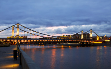 Fototapeta na wymiar Krymsky Bridge or Crimean Bridge at night is a steel suspension bridge in Moscow, Russia.