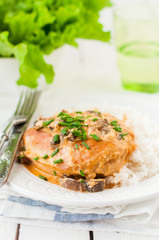 Chicken Breast Sauteed in Creamy Mushroom Sauce over Rice