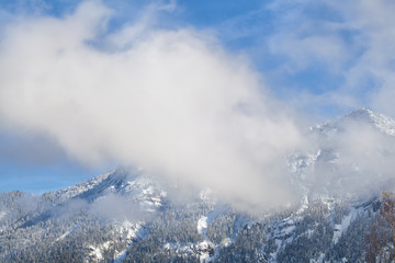 mountain peaks in clouds