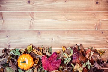 Autumnal leaf pattern on desk