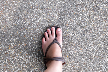 bare foot on floor background