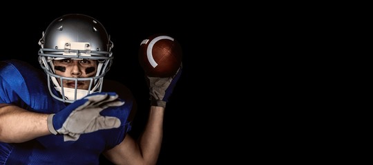 Composite image of portrait  of american football throwing ball