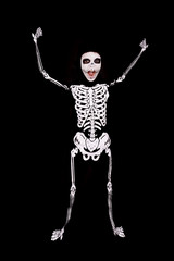 Boy in Halloween skeleton costume