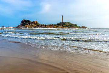 Ke Ga island with ancient lighthouse built in 1890's by French, Binh Thuan province, Vietnam.