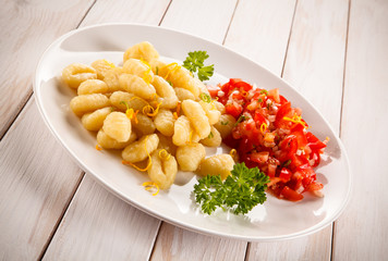 Gnocchi with tomato salad