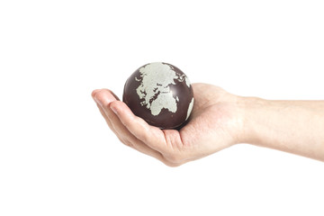 Hand holding Earth isolated on white