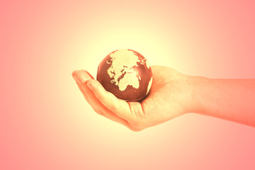 Hand holding Earth