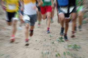 Abstract background.Marathon runners in the race