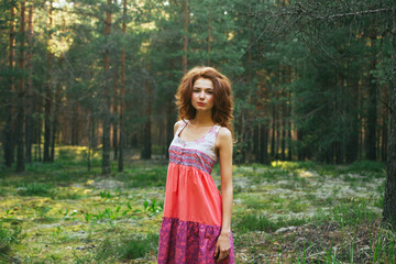 redhead girl in the forest