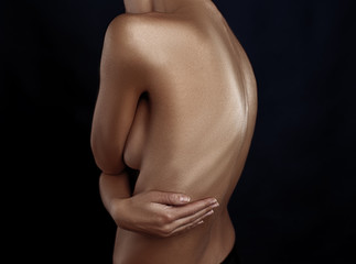 Female hand on shoulder