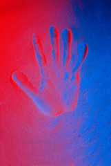 Background with colorfully lit sand