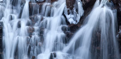 Muurstickers Winter waterfall © massife