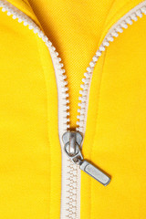 zipper on yellow shirt