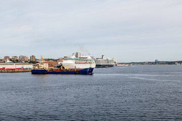 Fototapeta na wymiar Two Cruise Ships and Freighter in Halifax