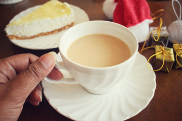 Lemon cheese cake with milk tea in christmas day