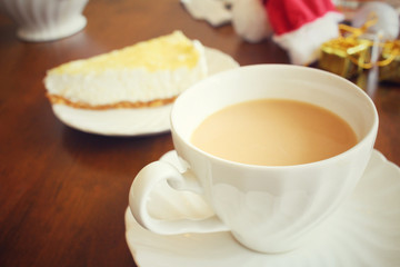 Lemon cheese cake with milk tea in christmas day