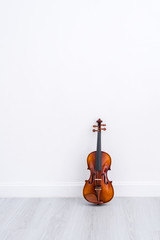 Classical cello on white wall background