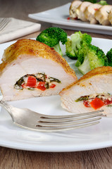 Chicken breast stuffed  ricotta, tomato and spinach