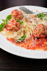Pasta in tomato gravy with meatballs
