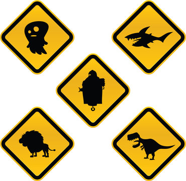 A set of funny cartoon caution signs featuring a ghost, a shark, a robot, a lion and a dinosaur.