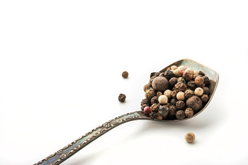 Pepper mix in the vintage metal spoon  at the  right