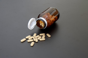 Medicine out of the bottle.