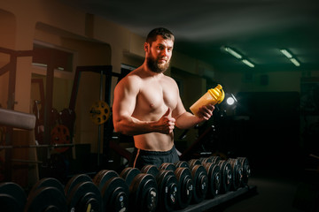 man in the gym with shaker