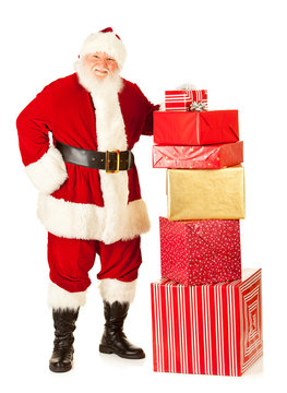 Santa: Standing By Large Stack of Gifts