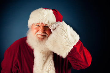 Naklejka premium Santa: Cheerful Santa with Glasses