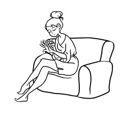 Girl in bathrobe make manicure on the couch
