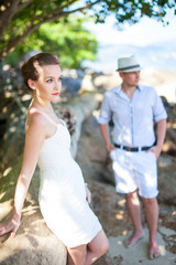 Obraz premium Couple getting marriage on the beach. Seletive focus